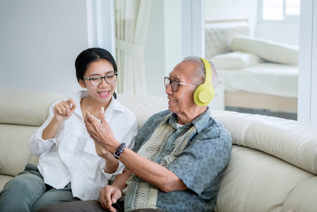 Senior with dementia listening to music